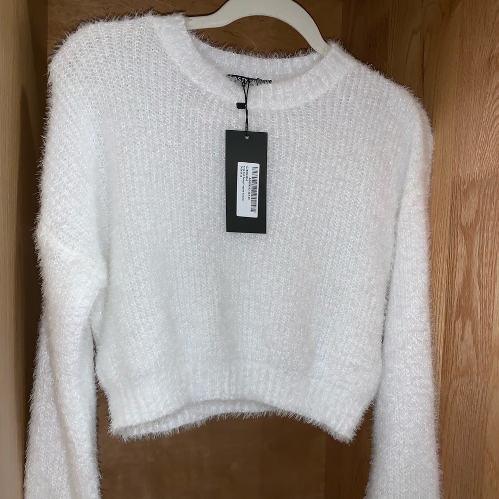 fuzzy white sweater